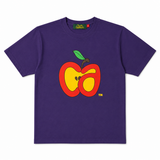 A purple short-sleeve t-shirt with a  graphic of a cut apple on the chest, featuring red, yellow, and green colors. The brand 'Charlie Appleseed' is visible on the inner neck label.